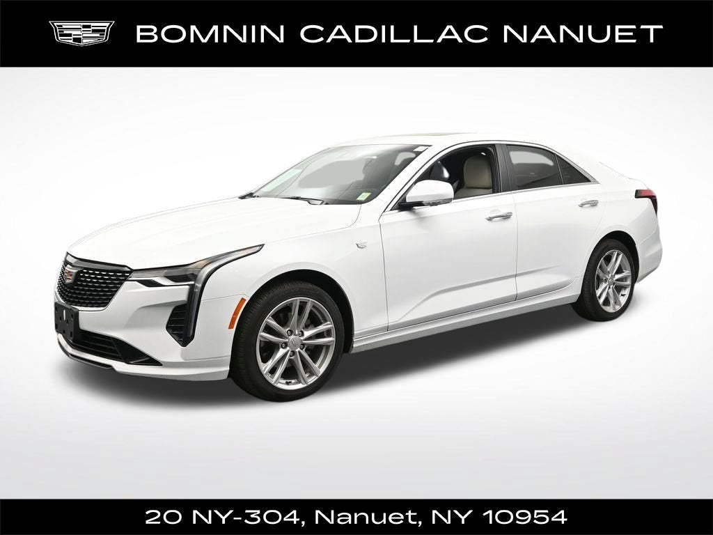 2023 Cadillac CT4 Luxury in Summit White — front three-quarter view