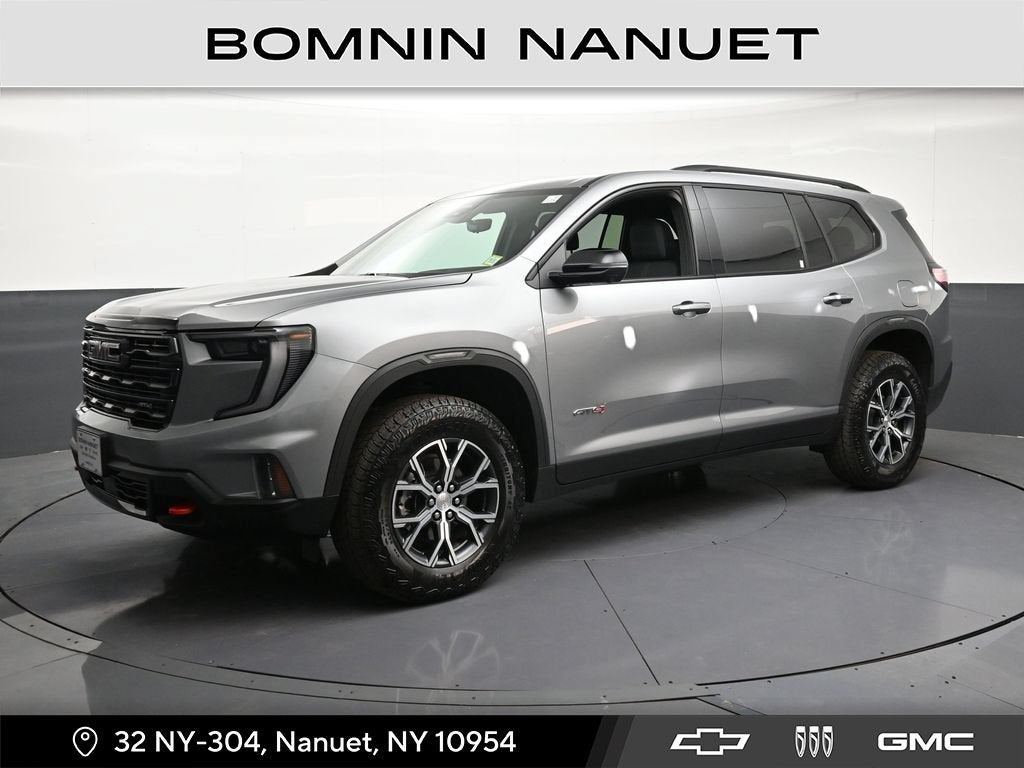 2026 GMC Acadia AT4 in Sterling Metallic — front three-quarter view