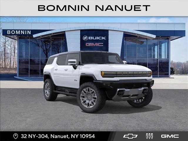 2025 GMC HUMMER EV SUV 3X in Interstellar White — front three-quarter view