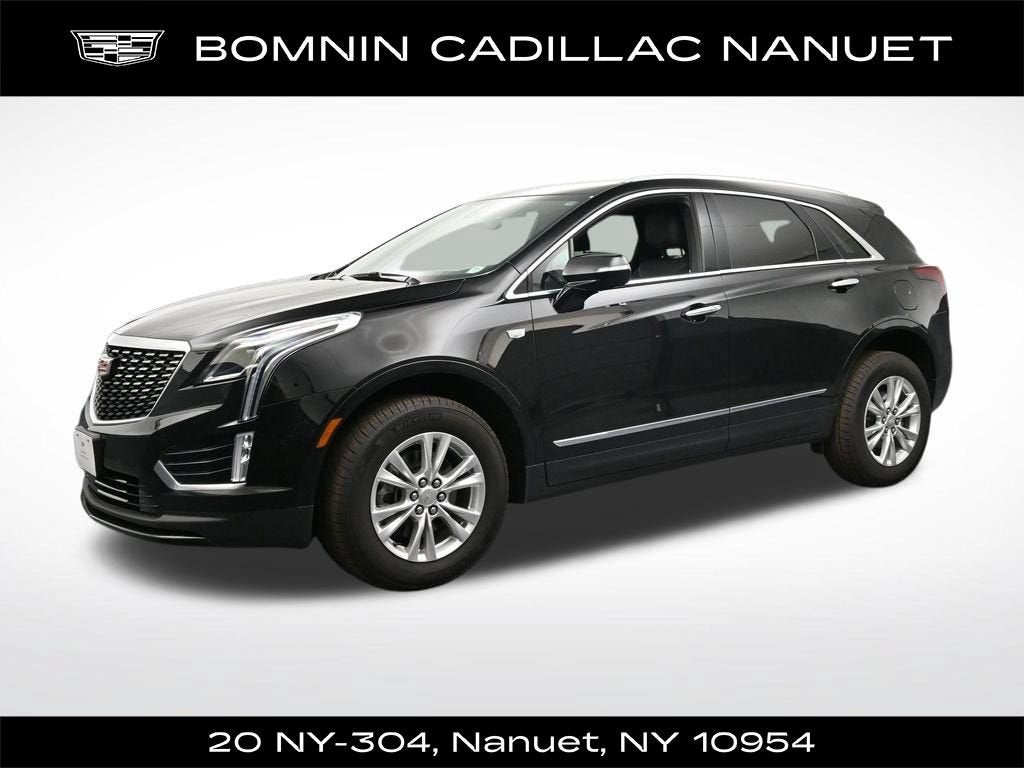 2025 Cadillac XT5 Luxury in Stellar Black Metallic — front three-quarter view
