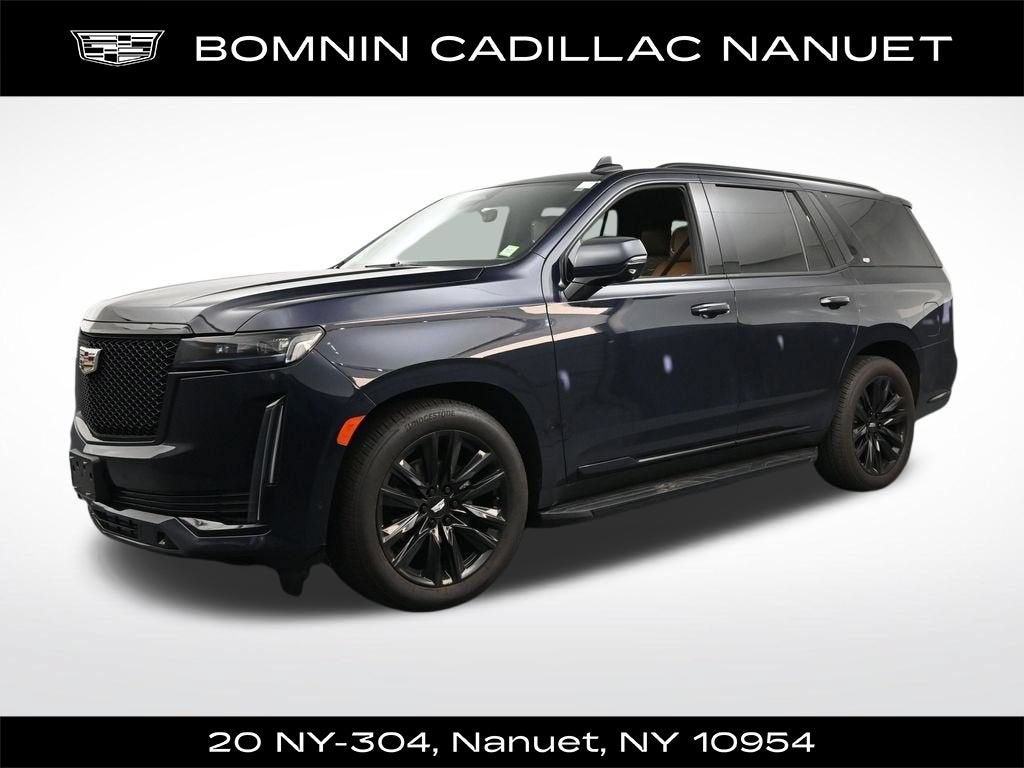 2021 Cadillac Escalade Sport in Dark Moon Blue Metallic — front three-quarter view