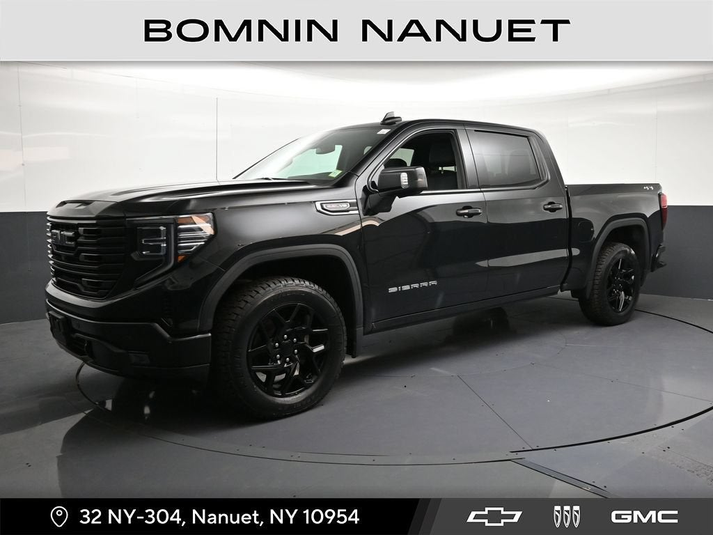 2023 GMC Sierra 1500 SLT in Onyx Black — front three-quarter view